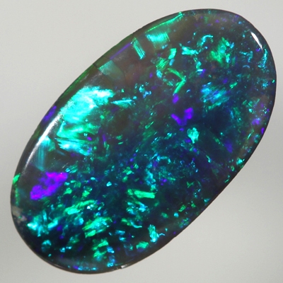 SOLID BLACK OPAL Bright sparkling golden green and turquoise